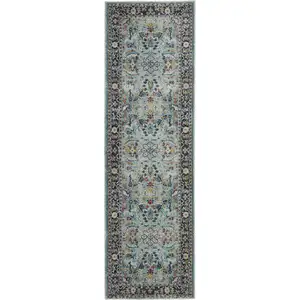 Photo of 6' Teal Blue Orange and Black Floral Distressed Non Skid Runner Rug