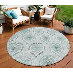 Photo of 8' Teal Blue Silver And Gray Round Medallion Washable Indoor Outdoor Area Rug