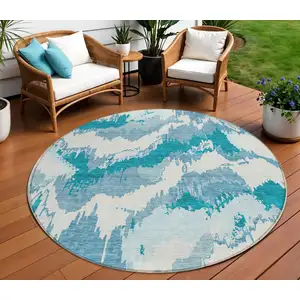 Photo of 8' Teal Blue Sky Blue And Aqua Round Abstract Washable Indoor Outdoor Area Rug