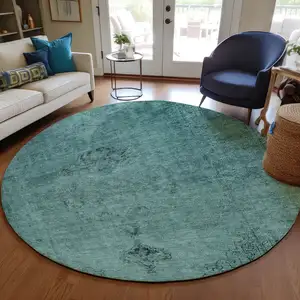 Photo of 8' Teal Blue Turquoise And Charcoal Round Oriental Washable Indoor Outdoor Area Rug