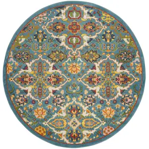 Photo of 5' Teal and Ivory Round Floral Power Loom Area Rug