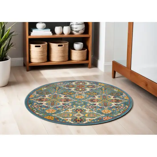 5' Teal and Ivory Round Floral Power Loom Area Rug Photo 1