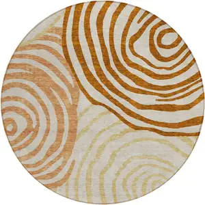 Photo of 8' Terra Cotta Copper And Gold Round Abstract Washable Indoor Outdoor Area Rug