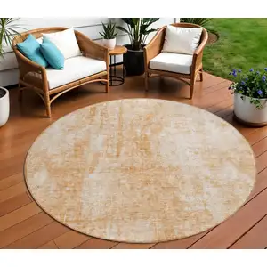 Photo of 8' Terra Cotta Copper And Ivory Round Abstract Washable Indoor Outdoor Area Rug