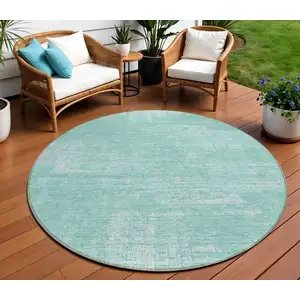 Photo of 8' Turquoise And Teal Blue Round Abstract Washable Indoor Outdoor Area Rug