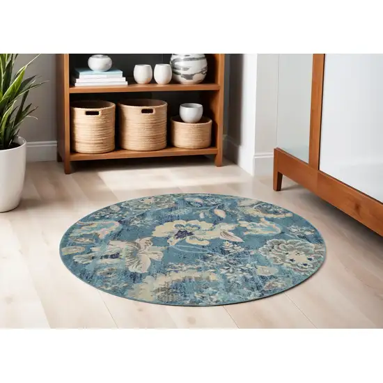 5' Turquoise Cream and Navy Blue Floral Distressed Round Rug Photo 1