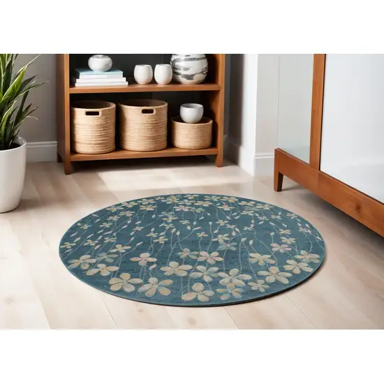 5' Turquoise and Cream Botanical Leaves Round Rug Photo 1