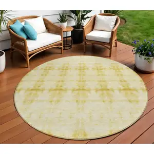 Photo of 8' Wheat And Gold Round Geometric Washable Indoor Outdoor Area Rug