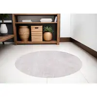 Photo of 8' White Round Abstract Non Skid Area Rug