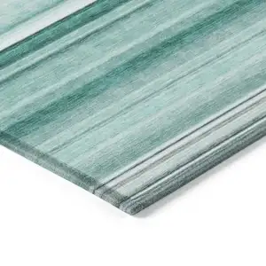 Photo of 3' X 4' Aqua Striped Washable Non Skid Indoor Outdoor Area Rug