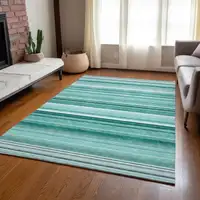 Photo of 3' X 5' Aqua Striped Washable Non Skid Indoor Outdoor Area Rug