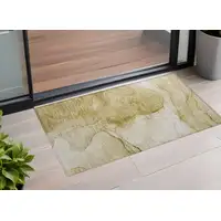 Photo of 3' X 5' Beige Abstract Washable Non Skid Indoor Outdoor Area Rug