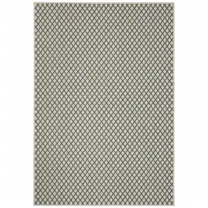 Photo of 6' X 9' Beige Geometric Stain Resistant Indoor Outdoor Area Rug