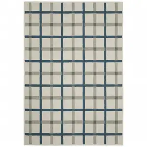 Photo of 2' X 3' Beige Geometric Stain Resistant Indoor Outdoor Area Rug