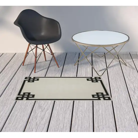 2' X 3' Beige Stain Resistant Indoor Outdoor Area Rug Photo 2