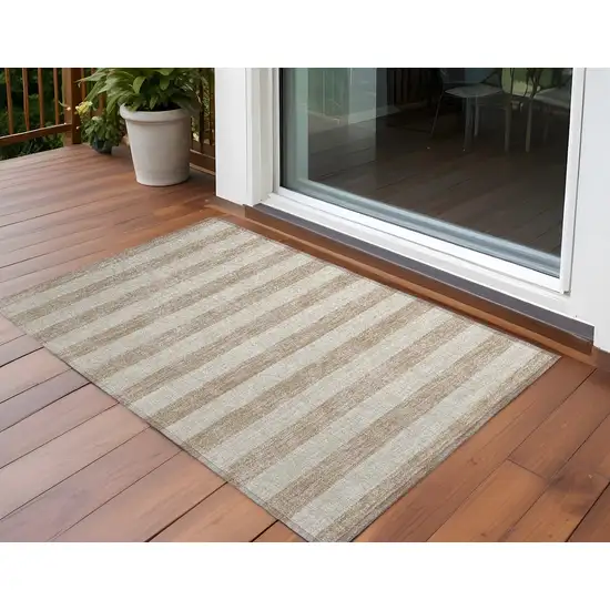 3' X 4' Beige Striped Washable Non Skid Indoor Outdoor Area Rug Photo 1