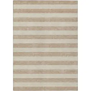 Photo of 3' X 5' Beige Striped Washable Non Skid Indoor Outdoor Area Rug