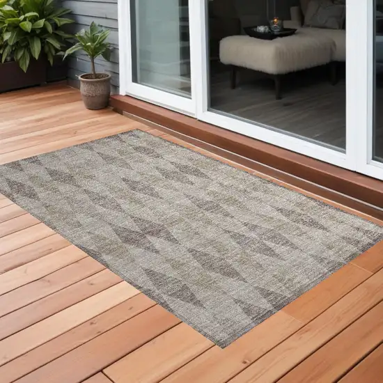 3' X 5' Beige Taupe and Brown Geometric Washable Non Skid Indoor Outdoor Area Rug Photo 1