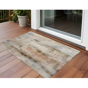 Photo of 3' X 4' Beige and Brown Washable Non Skid Indoor Outdoor Area Rug