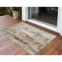 Photo of 3' X 4' Beige and Brown Washable Non Skid Indoor Outdoor Area Rug