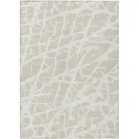 Photo of 3' X 5' Beige and Ivory Abstract Washable Non Skid Indoor Outdoor Area Rug