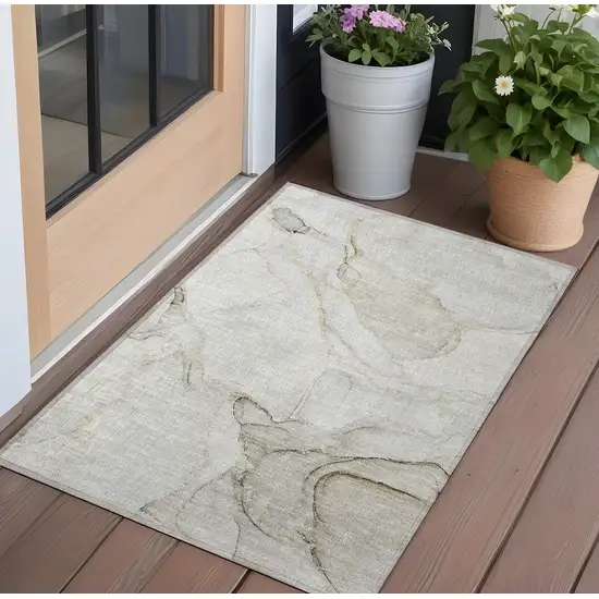 Beige and Ivory Abstract Washable Indoor Outdoor Area Rug Photo 1