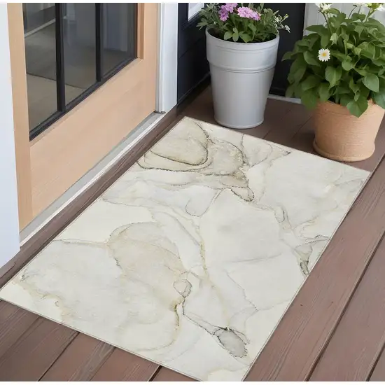 Beige and Ivory Abstract Washable Non Skid Indoor Outdoor Area Rug Photo 1