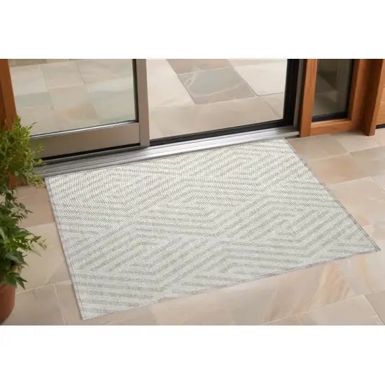 3' X 4' Beige and Ivory Geometric Washable Non Skid Indoor Outdoor Area Rug Photo 1