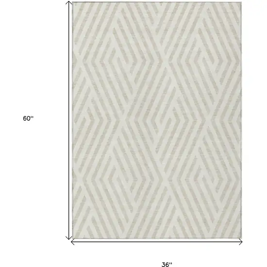 3' X 5' Beige and Ivory Geometric Washable Non Skid Indoor Outdoor Area Rug Photo 3