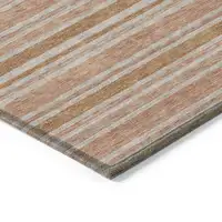 Photo of 3' X 4' Beige and Orange Striped Washable Non Skid Indoor Outdoor Area Rug