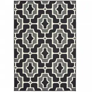 Photo of 9' X 13' Black Geometric Stain Resistant Indoor Outdoor Area Rug