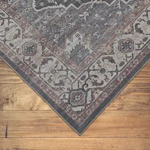 Photo of 5' X 8' Black Oriental Stain Resistant Area Rug