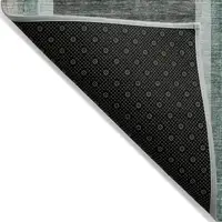 Photo of 3' X 4' Black and Green Abstract Washable Non Skid Indoor Outdoor Area Rug