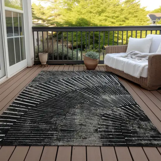 3' X 4' Black and Ivory Abstract Washable Non Skid Indoor Outdoor Area Rug Photo 8