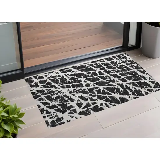 3' X 4' Black and White Abstract Washable Non Skid Indoor Outdoor Area Rug Photo 1