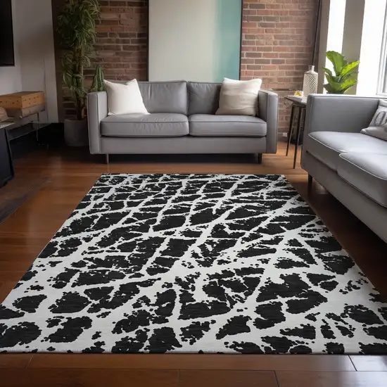 3' X 4' Black and White Abstract Washable Non Skid Indoor Outdoor Area Rug Photo 9