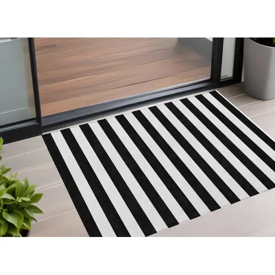 3' X 4' Black and White Striped Washable Non Skid Indoor Outdoor Area Rug Photo 1