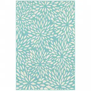 Photo of 6' X 9' Blue Floral Stain Resistant Indoor Outdoor Area Rug