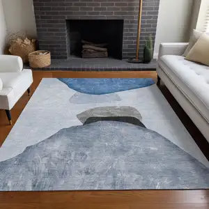 Photo of 3' X 5' Blue Gray and Black Abstract Washable Non Skid Indoor Outdoor Area Rug