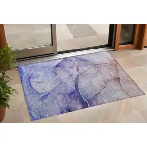 Photo of 3' X 5' Blue and Brown Abstract Washable Non Skid Indoor Outdoor Area Rug