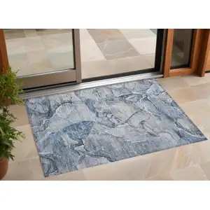 Photo of 3' X 5' Blue and Gray Abstract Washable Non Skid Indoor Outdoor Area Rug