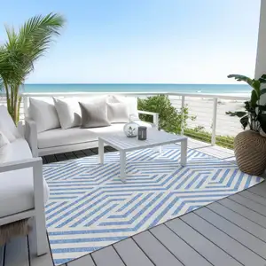 Photo of 3' X 4' Blue and Ivory Geometric Washable Non Skid Indoor Outdoor Area Rug