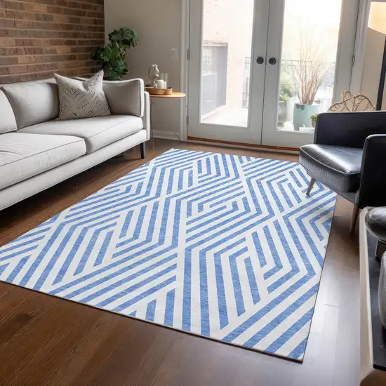 3' X 5' Blue and Ivory Geometric Washable Non Skid Indoor Outdoor Area Rug Photo 9