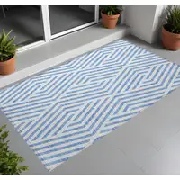 Photo of 3' X 5' Blue and Ivory Geometric Washable Non Skid Indoor Outdoor Area Rug