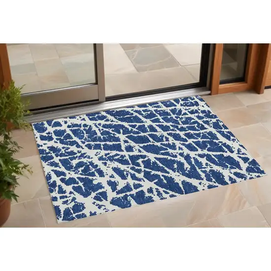 Blue and White Abstract Washable Non Skid Indoor Outdoor Area Rug Photo 1