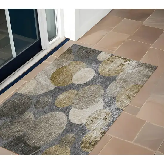 Brown Beige and Ivory Abstract Washable Non Skid Indoor Outdoor Area Rug Photo 1