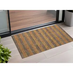 Photo of 3' X 4' Brown and Tan Striped Washable Non Skid Indoor Outdoor Area Rug