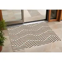 Photo of 3' X 5' Brown and White Geometric Washable Non Skid Indoor Outdoor Area Rug