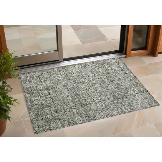 3' X 4' Cream and Tan Floral Washable Non Skid Indoor Outdoor Area Rug Photo 1