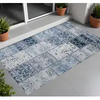 Photo of 3' X 4' Denim Blue Patchwork Washable Non Skid Indoor Outdoor Area Rug